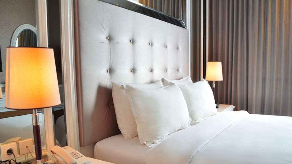 Hotel Golden Tulip Legacy Surabaja Pokoj fotografie